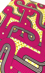 TESSUTO WAX PRINT, GIALLO FUCSIA, MOTIVO GEOMETRICO E OPTICAL, DETTAGLI